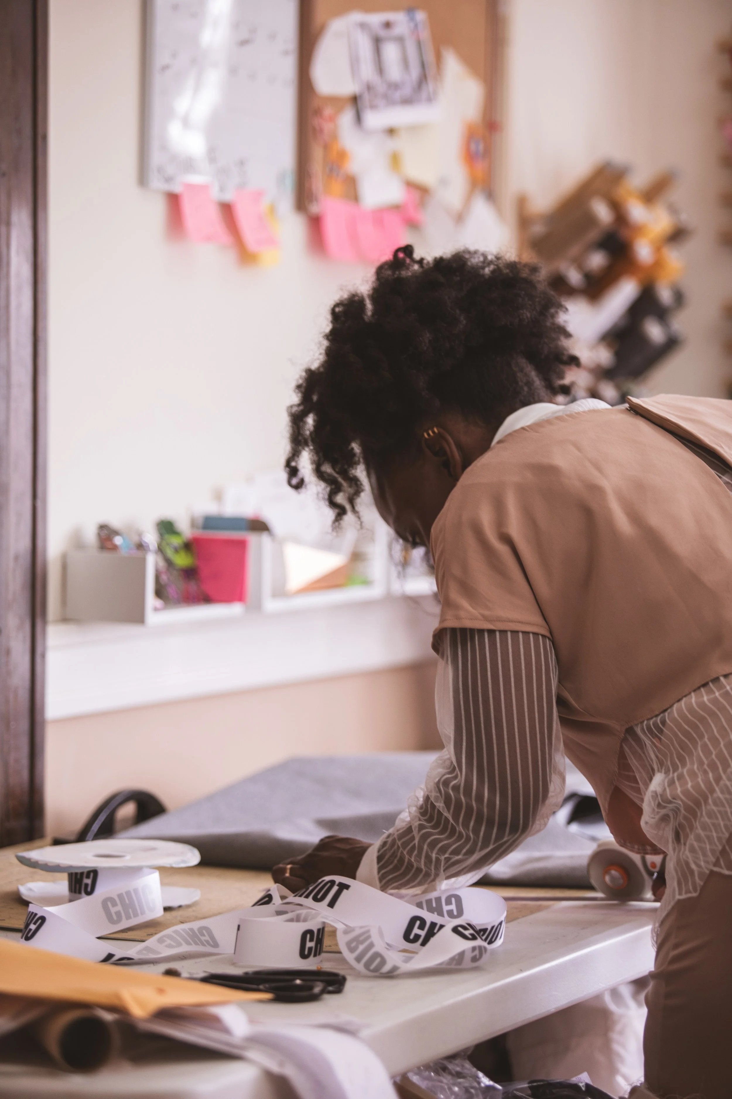 woman working at a cutting table