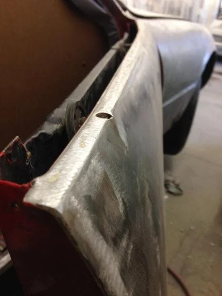 When we got the car the handle bump outs were flat. Here is an image showing the handle bump out on the passenger door. These will be very important because this 1971 364 GTB/4 Ferrari Daytona is getting painted Argento Silver. These little accent bumps will add amazing character to the body of the car. Silver is an amazing color for the car but without a doubt, the most difficult color to paint. You see every flaw do to the way the metal lays on the body.