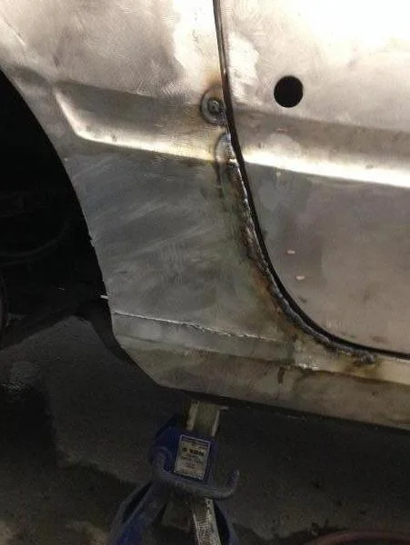 Once we welded the jamb area we were able to close the door to inspect for fitment and additional welding as necessary.