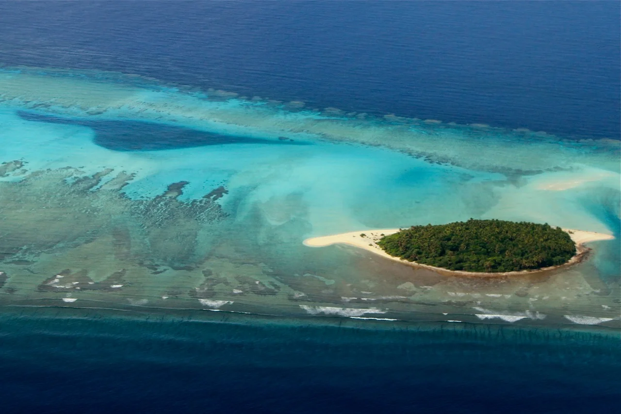 Many low lying islands are at risk of disappearing due to sea level rise. © Wayne Sentman