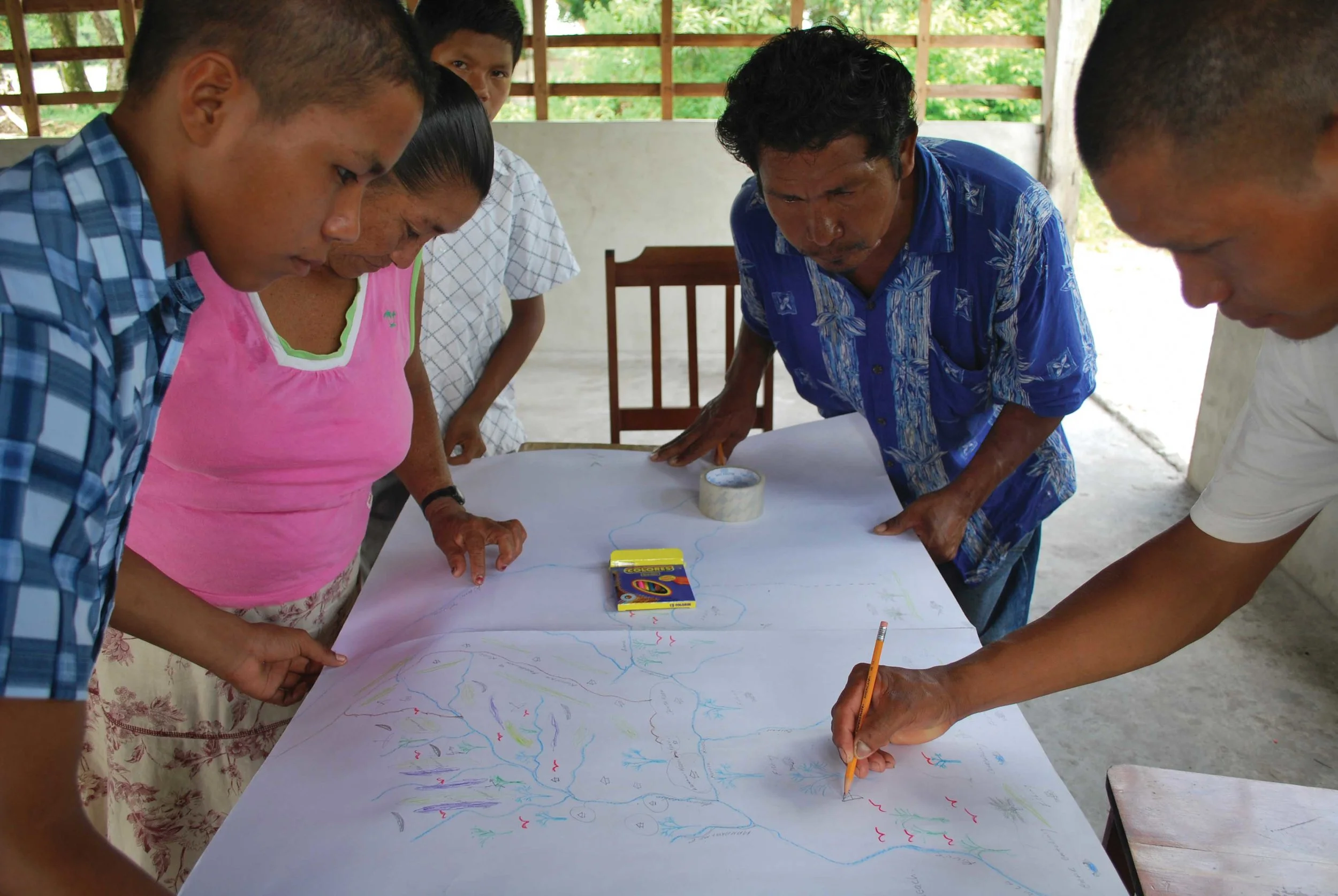 Local stakeholders discuss the prospective boundaries of Shell Beach Protected Area on Guyana’s coast. The park’s boundaries were defined through a consultative process that engaged all local stakeholder groups and ensured that traditional user rights were maintained within the park. © Michelle Kalamandeen