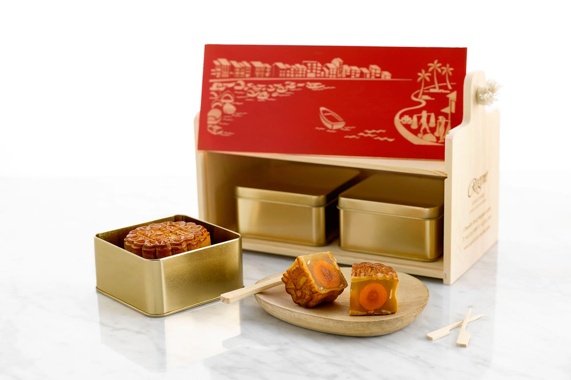 regent-singapore-mid-autumn-flavours_baked-mooncakes-with-box.jpg
