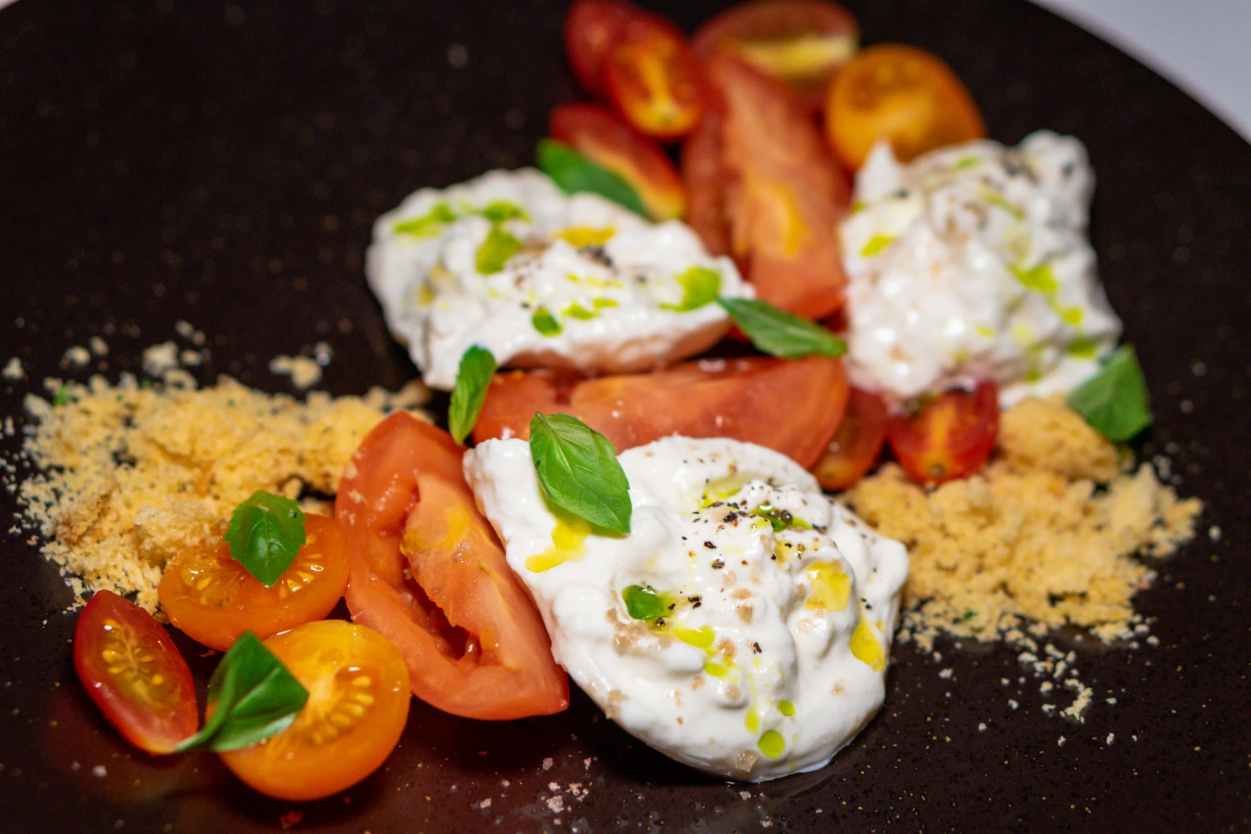 Burratina and marinated heirloom tomatoes