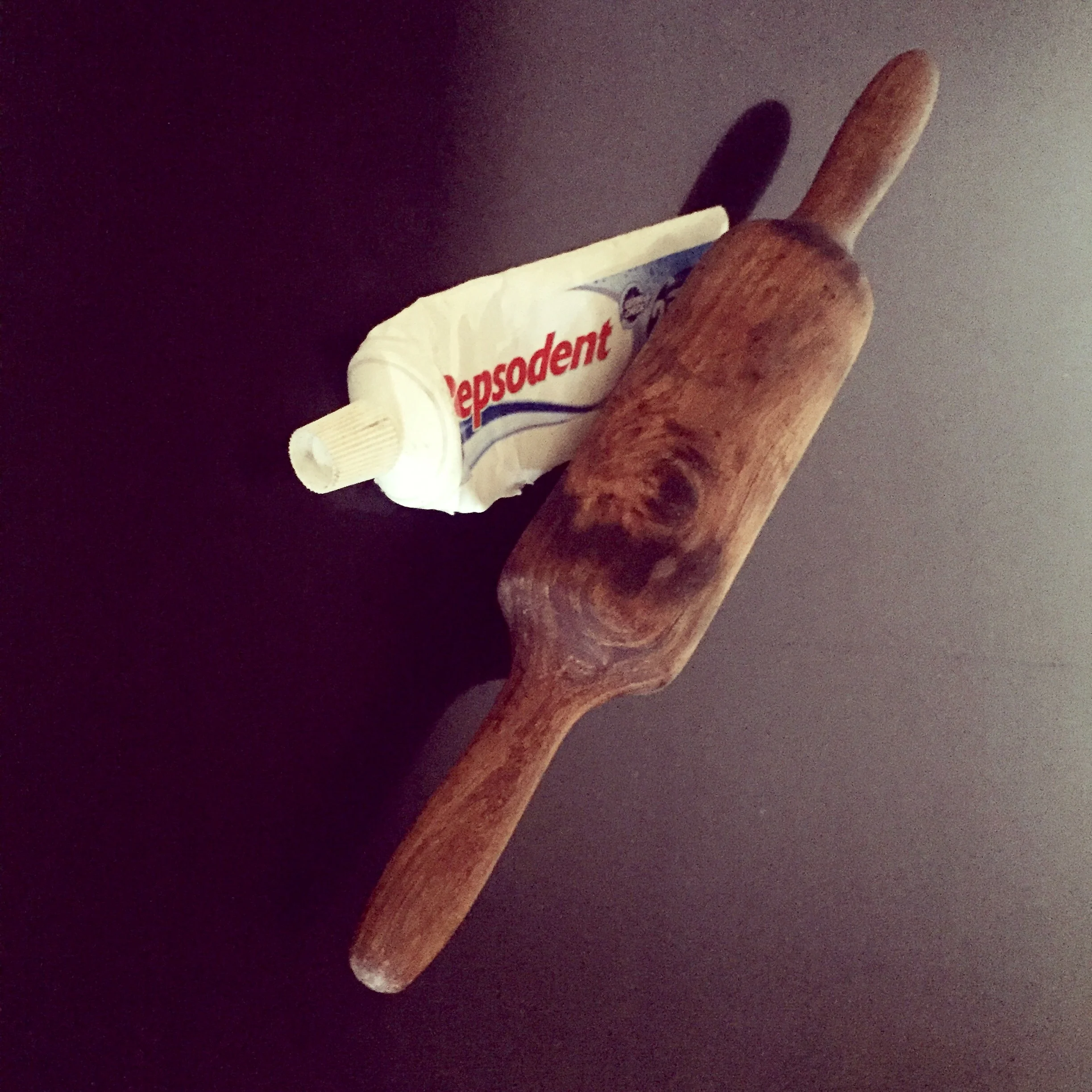 In my house, this image wasn't an unusual sight. The toothpaste from the bathroom met the belan from the kitchen at the fag end of its life. Whatever was left was squeezed out of the tube and somehow it was always magically sufficient for the family of four to brush from. 'Mitvyayi bano' remarked my mother ever so often while I frowned upon this practice in my teens. Years later, I follow the same ritual, attempting to keep the promise of being frugal.