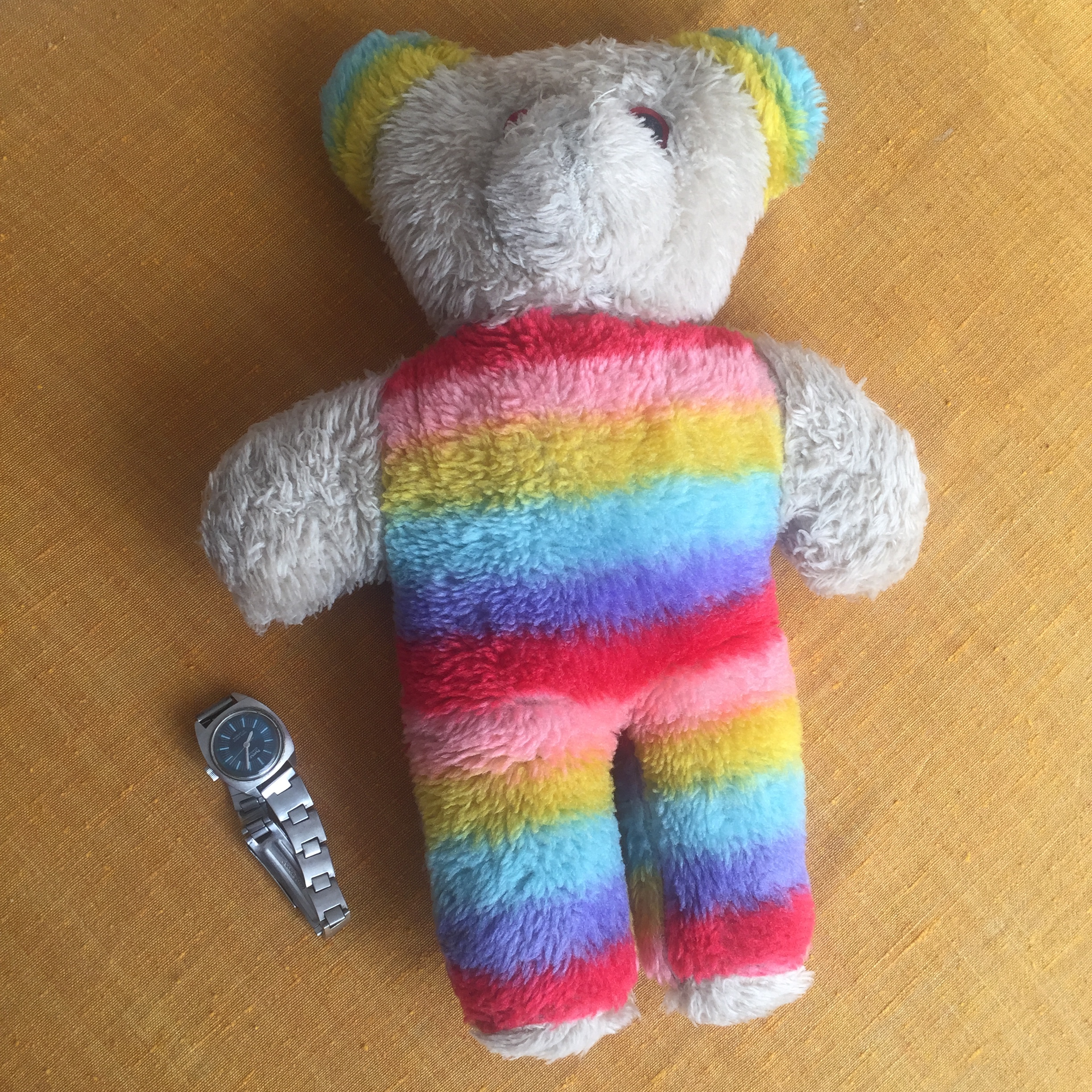  So my first teddy wasn't the Archie’s kind - fluffy, soft, baby pink with a brown nose. Mine was this technicolour one without a nose. He had always been without a nose, it was my elder brother's hand-me-down toy and I nurtured a love-hate relations