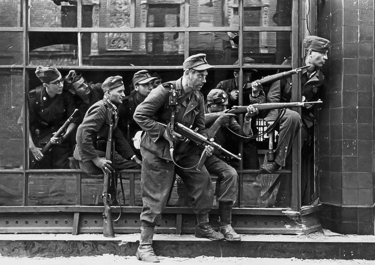 Street fighting during the Warsaw Uprising in August 1944, showing German troops operating in the Wola district. The unit cannot be conclusively identified