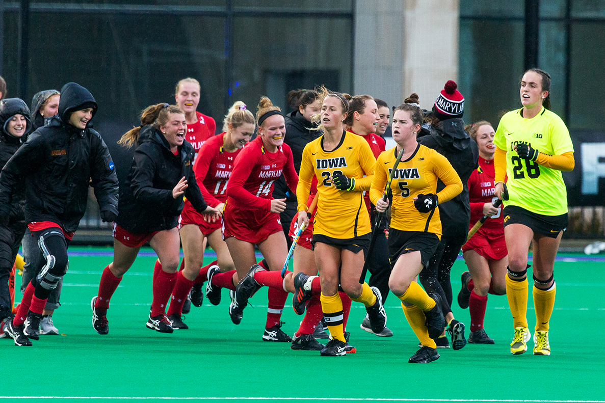 Iowa players jog off the field as Maryland players run on to the field after the Championship Game in the Big Ten Field Hockey Tournament at Lakeside Field in Evanston, IL on Sunday, Nov. 3, 2018. The no. 2 ranked Terrapins defeated the no. 8 ranked