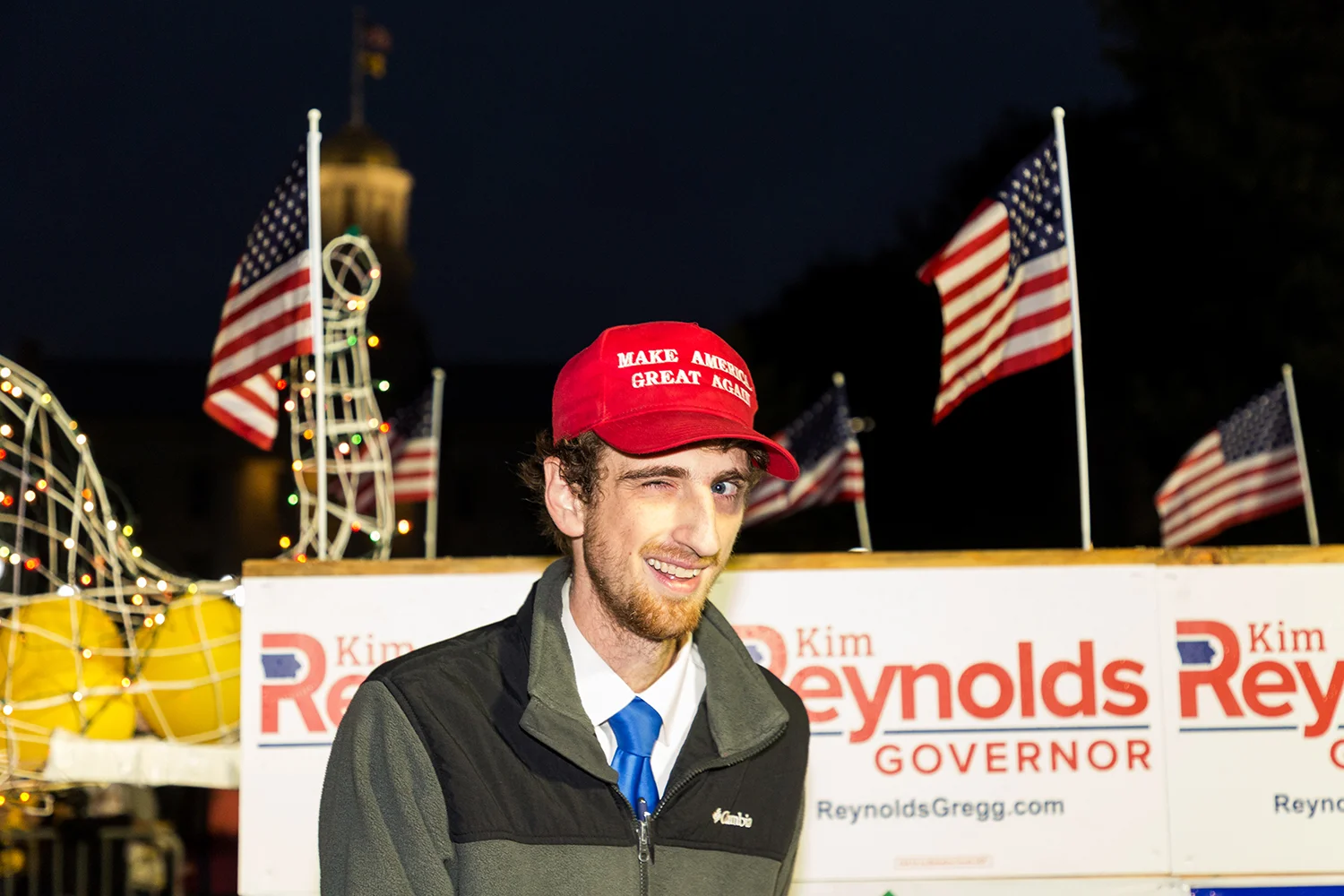 A member of the University of Iowa Young Republicans marches during the University of Iowa homecoming parade on Friday, 6 Oct., 2017.