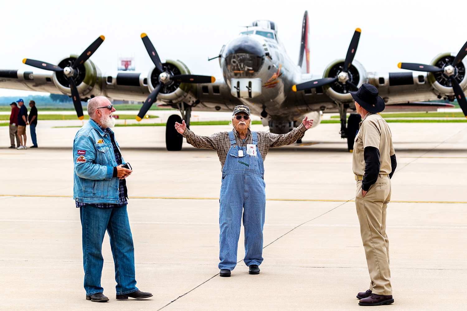  Robert H. Clark of Cedar Rapids shares a story with the crew of the Experimental Aircraft Association's B-17G bomber 'Aluminum Overcast' at the Eastern Iowa Airport in Cedar Rapids on Tuesday, June 18, 2019. Clark flew 53 missions as a ball turret g