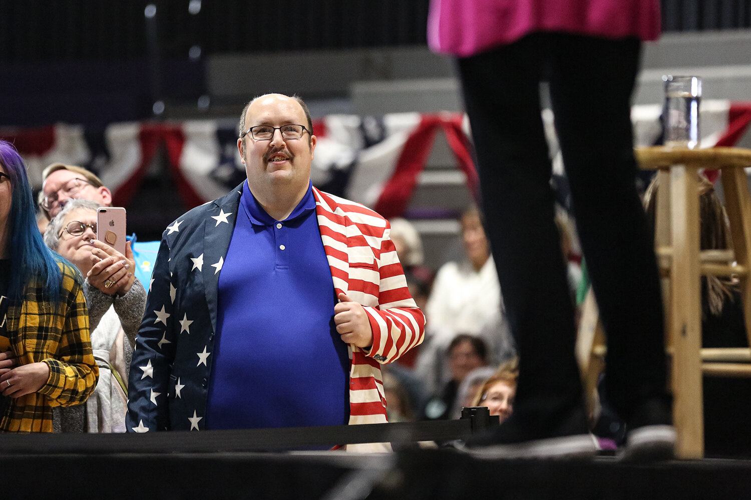  Marc Korver of Washington, IA listens to Senator Elizabeth Warren (D-MA) during a town hall rally at Taft Middle School in Cedar Rapids, IA on Saturday, Nov. 16, 2019. Korver has been to about 40 campaign events this caucus season where he asks cand