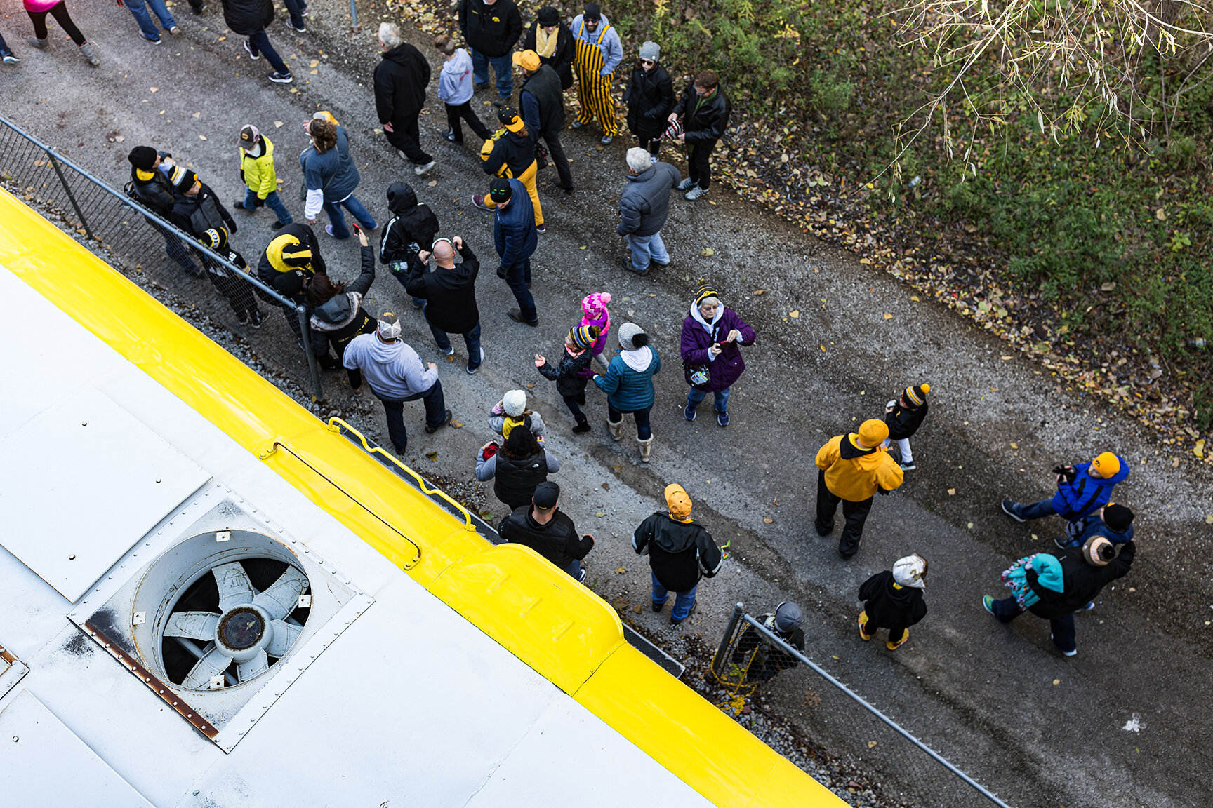  Fans disembark from the Hawkeye Express after its arrival at Kinnick Stadium on Saturday, Oct. 20, 2018.  