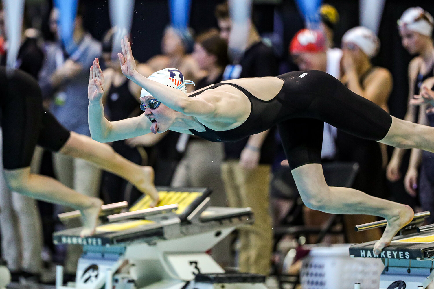  Mariclaire Lynch dives into the pool for the 50 Yard Freestyle  during the Big Ten Women’s Swimming and Diving Championships at the Campus Welfare and Recreation Center in Iowa City, IA on Thursday, Feb. 20, 2020.  