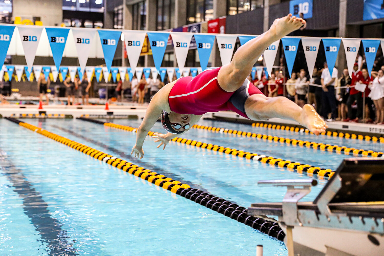  Kasja Dymek swims a preliminary heat of the 100 yard butterfly during the Big Ten Women’s Swimming and Diving Championships at the Campus Welfare and Recreation Center in Iowa City, IA on Friday, Feb. 21, 2020.  