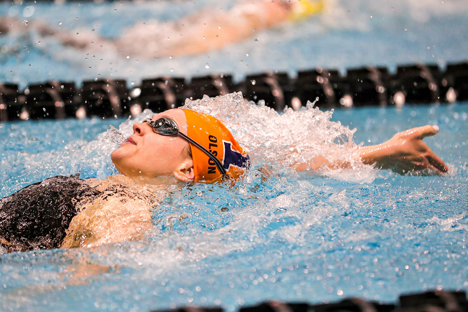  Abby Olson swims the consolation final of the 100 yard backstroke during the Big Ten Women’s Swimming and Diving Championships at the Campus Welfare and Recreation Center in Iowa City, IA on Friday, Feb. 21, 2020. 