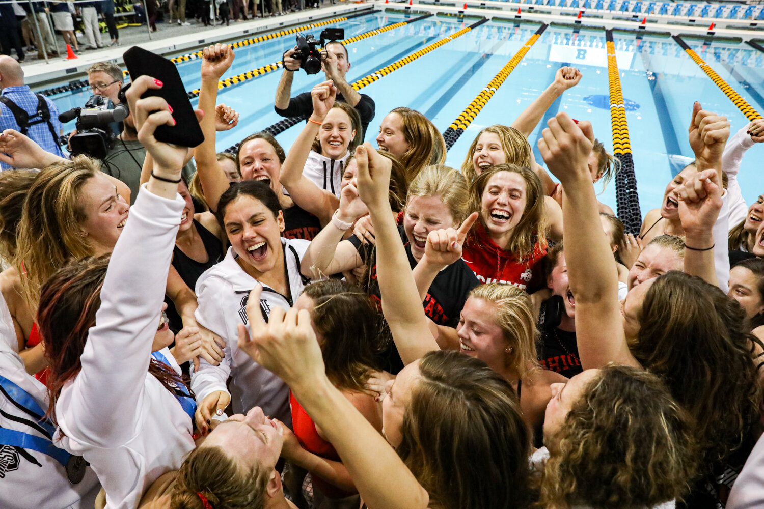  The Ohio State University Women’s Swimming and Diving Team celebrates winning the Big Ten Women’s Swimming and Diving Championships at the Campus Welfare and Recreation Center in Iowa City, IA on Saturday, Feb. 22, 2020.  