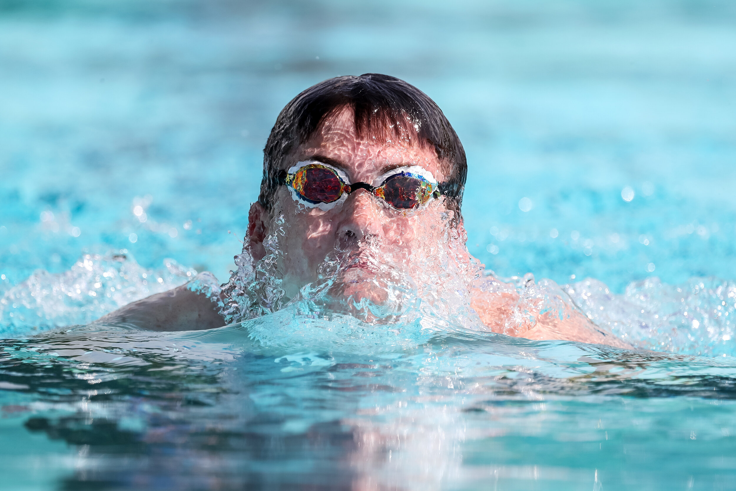  Tristan West breaches the water in the Boys 13-14 50 Yard Breaststroke during the All City Swim Meet at Cherry Hill Aquatic Center in Cedar Rapids on Saturday, July 20, 2019.  