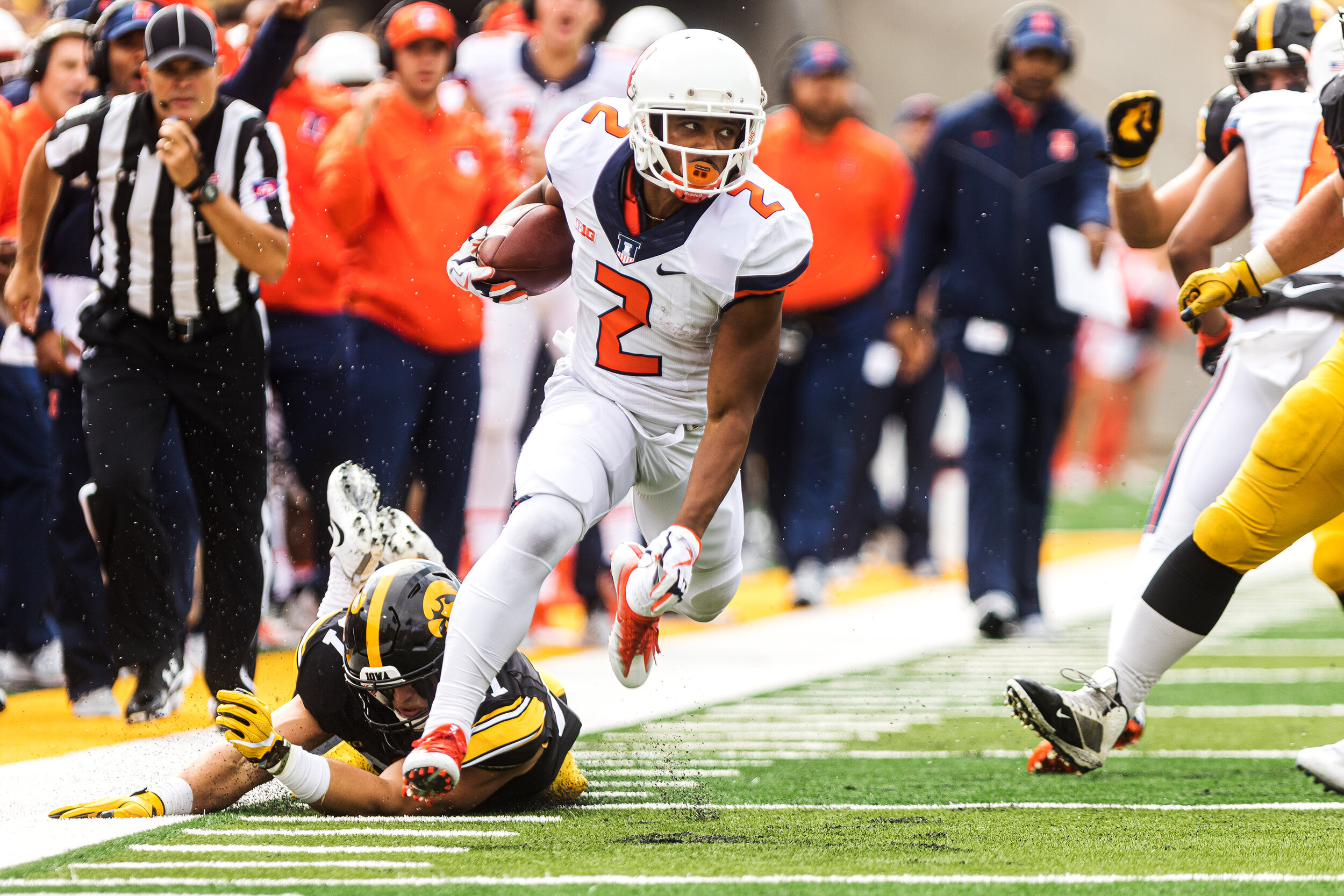  University of Illinois running back Reggie Corbin eyes the defense as he runs down the sideline at Kinnick Stadium during a game against the University of Iowa on Saturday, Oct. 7, 2017. The Hawkeyes defeated the Illini 45-15.  