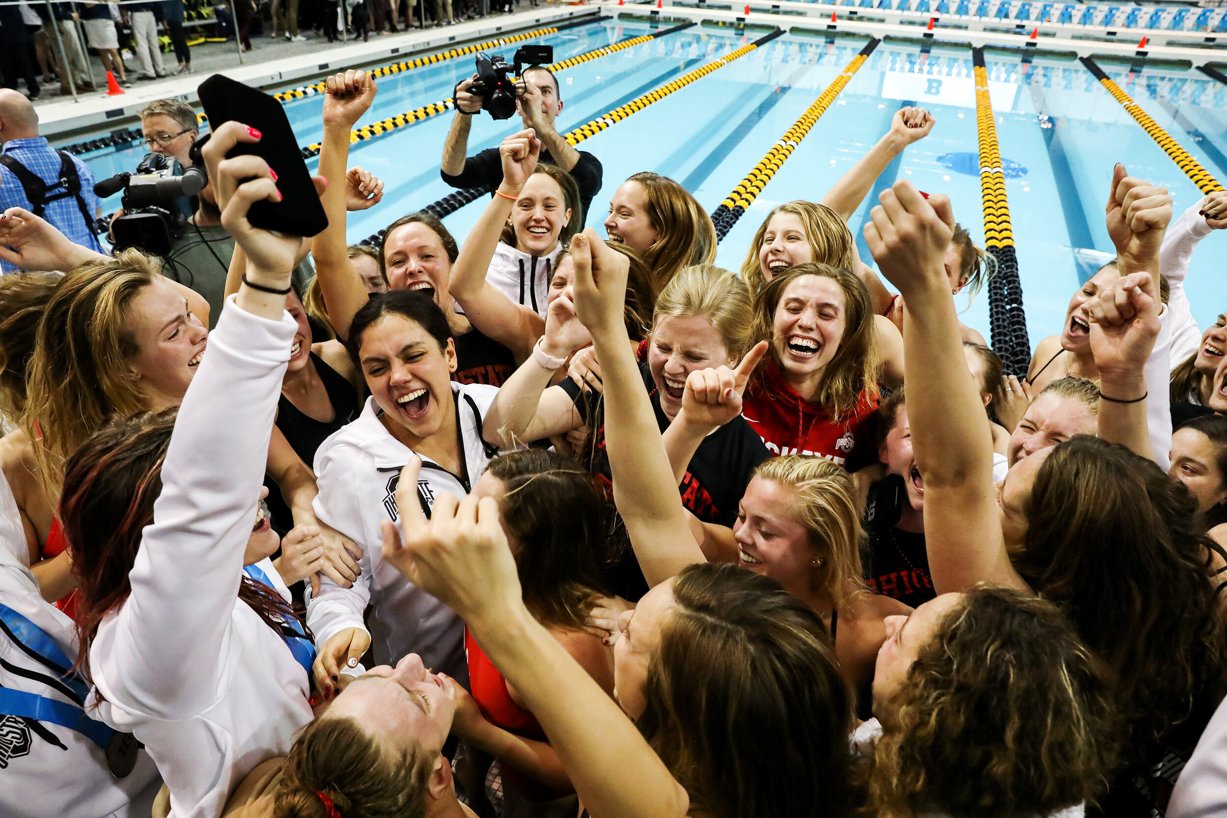  The Ohio State University Women’s Swimming and Diving Team celebrates winning the Big Ten Women’s Swimming and Diving Championships at the Campus Welfare and Recreation Center in Iowa City, IA on Saturday, Feb. 22, 2020. 