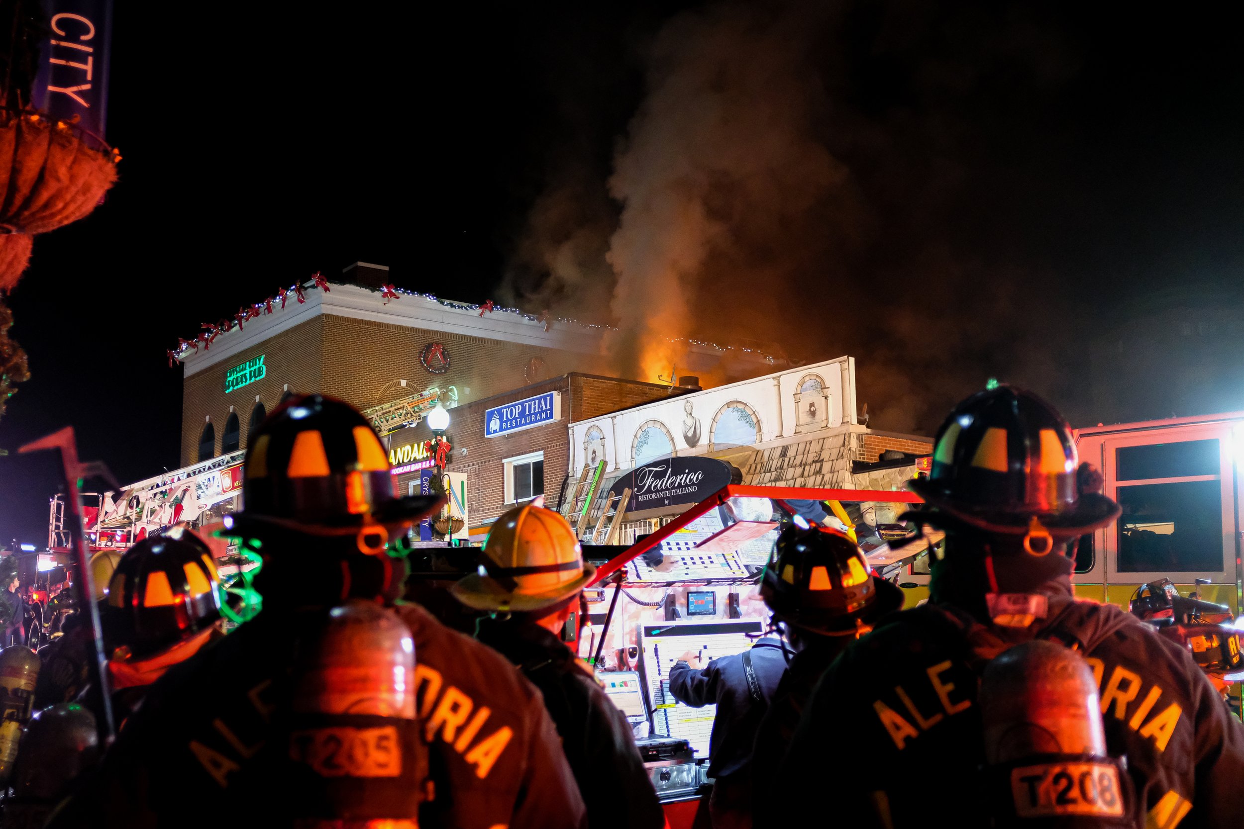  Firefighters from multiple departments respond to a fire on 23rd Street in Crystal City in Arlington, VA on the evening of December 4, 2021.  