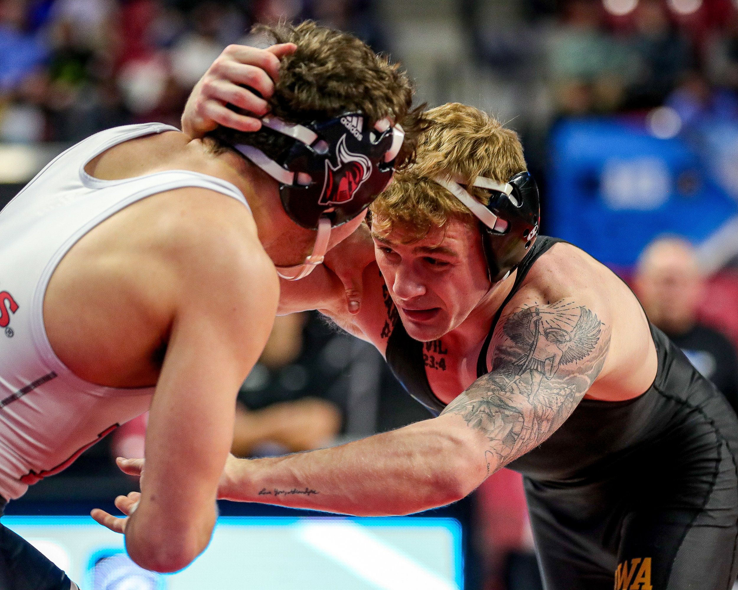  Iowa wrestler Brody Teske grapples with Rutgers’ Dylan Shawver in a 133-lb semifinal match during the Big Ten Wrestling Championships at the Xfinity Center in College Park, Maryland on Saturday, March 9, 2023. Teske lost 12-6. (David Harmantas/For t