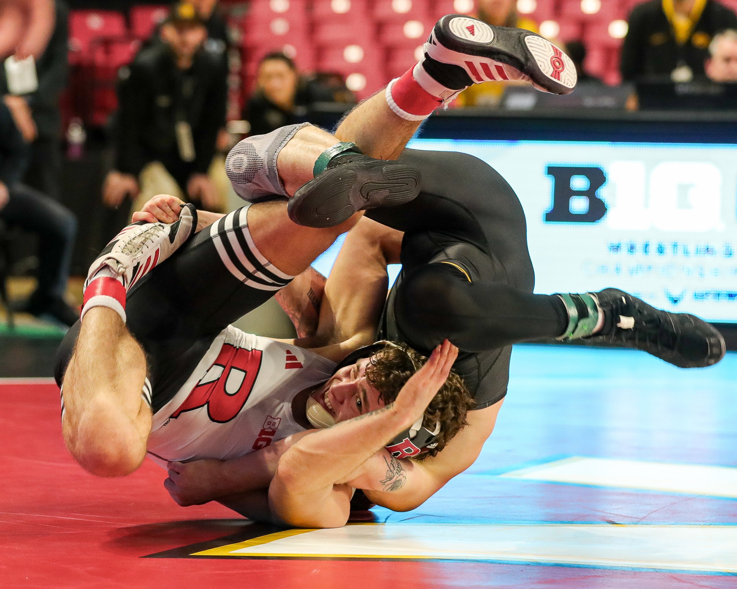  Iowa wrestler Brody Teske grapples with Rutgers’ Dylan Shawver in a 133-lb semifinal match during the Big Ten Wrestling Championships at the Xfinity Center in College Park, Maryland on Saturday, March 9, 2023. Teske lost 12-6. (David Harmantas/For t