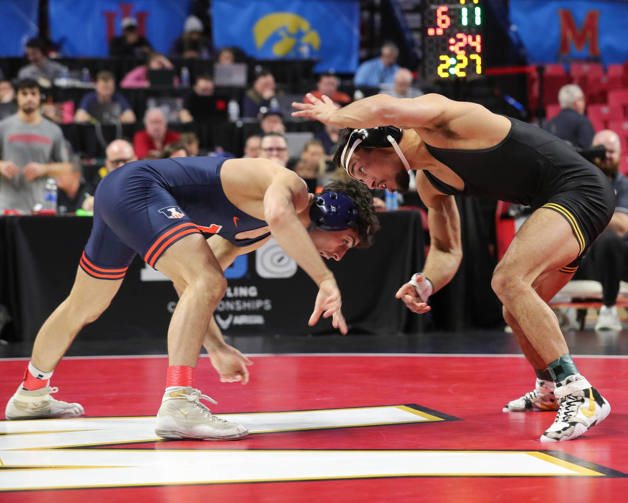  Iowa wrestler Real Woods grapples with Illinois’ Danny Pucino in a 141-lb quarterfinals match during the Big Ten Wrestling Championships at the Xfinity Center in College Park, Maryland on Saturday, March 9, 2023. Woods won 13-9. (David Harmantas/For