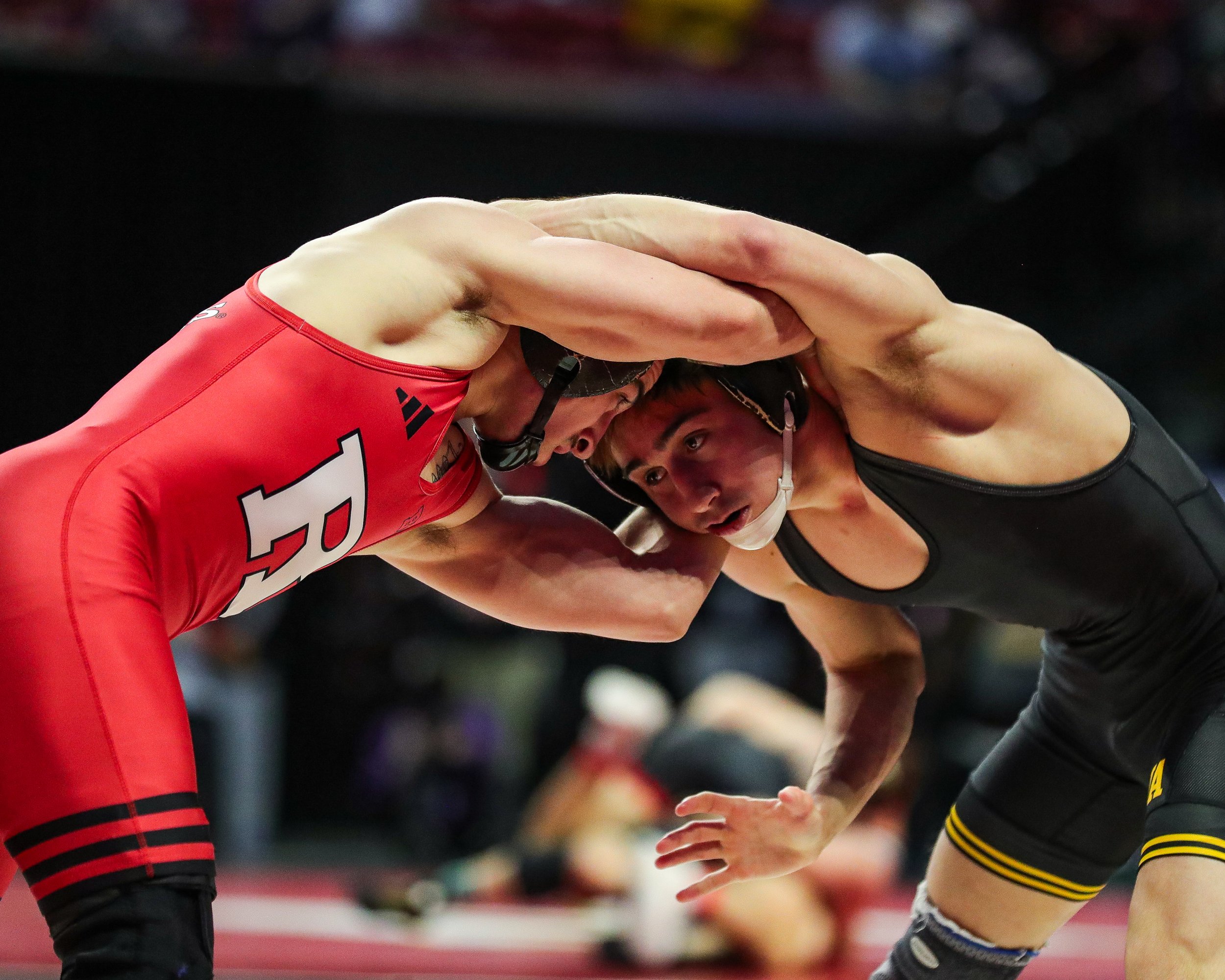  Iowa wrestler Drake Ayala grapples with Rutgers’ Dean Peterson in a 125-lb semifinal consolation match during the Big Ten Wrestling Championships at the Xfinity Center in College Park, Maryland on Sunday, March 10, 2023. Ayala won 4-1. (David Harman