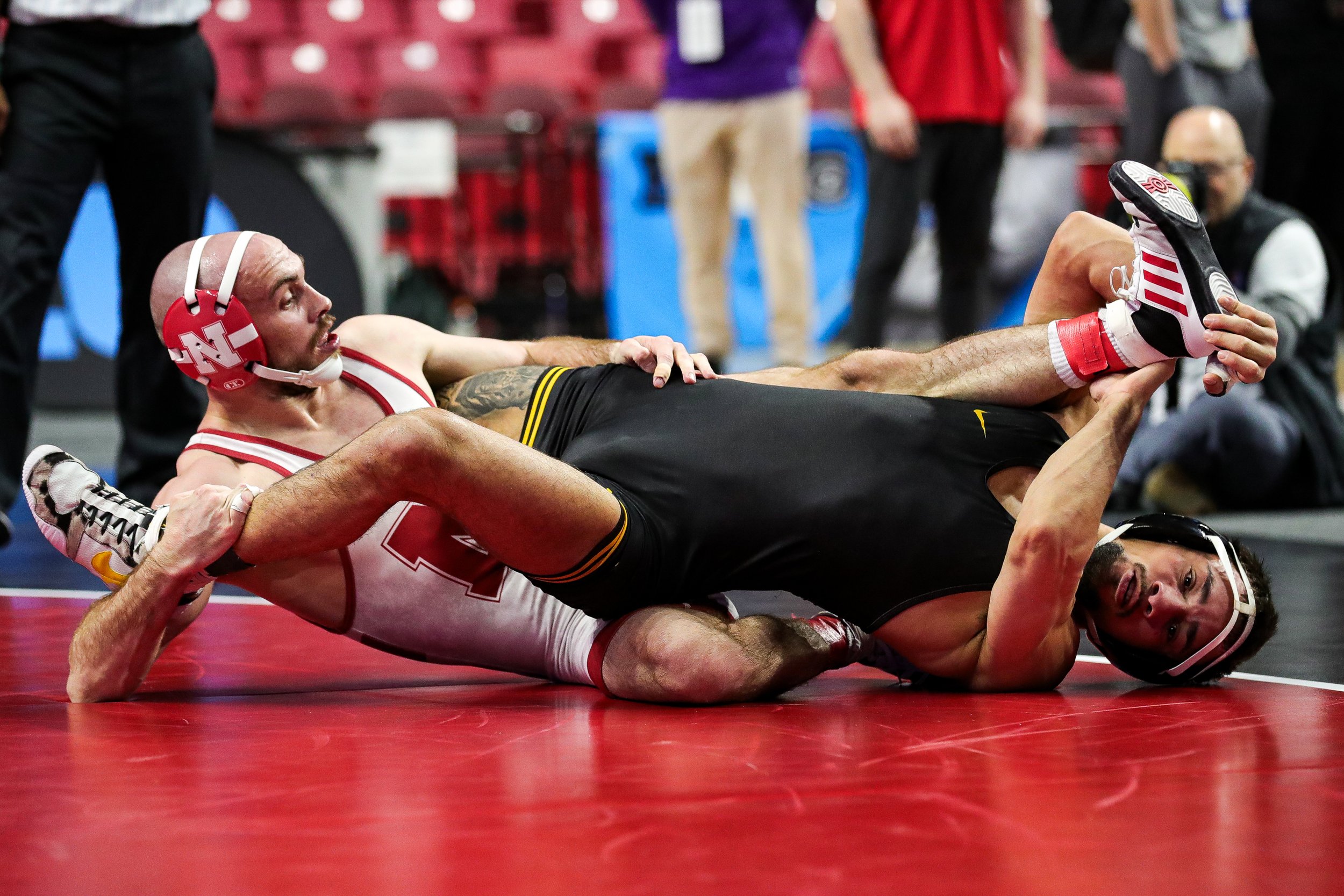  Iowa wrestler Real Woods grapples with Nebraska’s Brock Hardy in a 141-lb semifinal consolation match during the Big Ten Wrestling Championships at the Xfinity Center in College Park, Maryland on Sunday March 10, 2023. Woods won 8-4. (David Harmanta