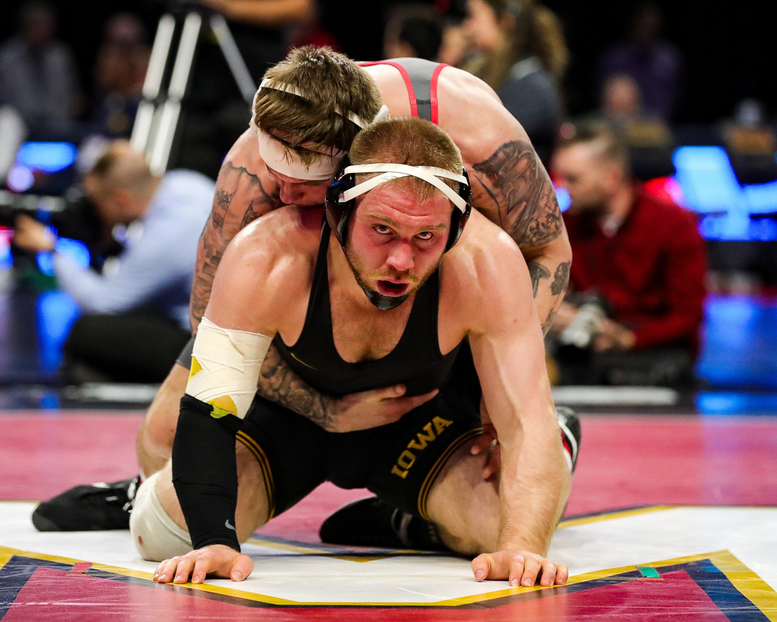  Iowa wrestler Patrick Kennedy grapples with Ohio State’s Rocco Welsh in a 174-lb semifinal consolation match during the Big Ten Wrestling Championships at the Xfinity Center in College Park, Maryland on Sunday, March 10, 2023. Kennedy lost 4-1. (Dav