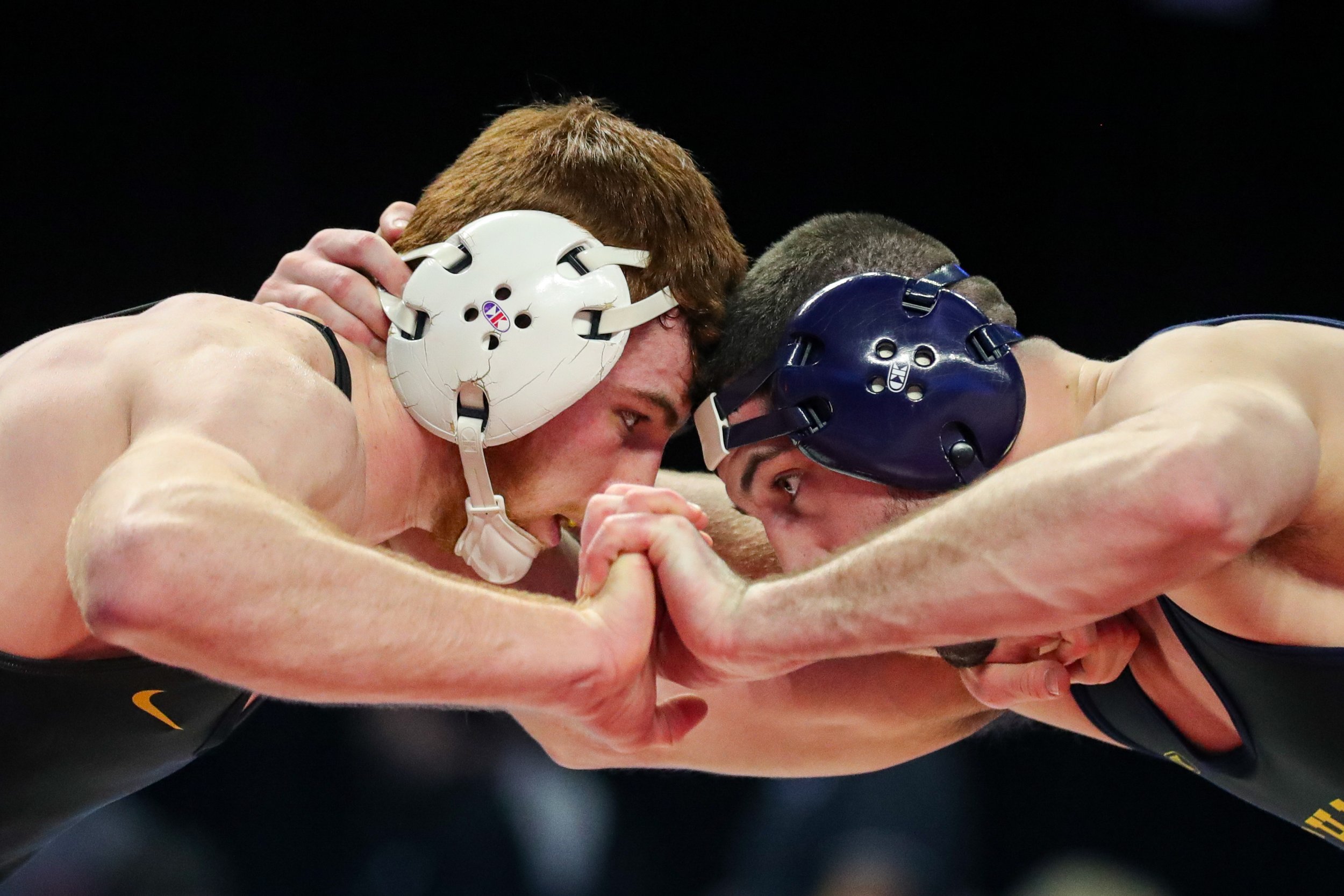  Iowa wrestler Michael Caliendo grapples with Michigan’s Cameron Amine in a 165-lb third-place match during the Big Ten Wrestling Championships at the Xfinity Center in College Park, Maryland on Sunday, March 10. Caliendo won 8-5 in SV1. (David Harma