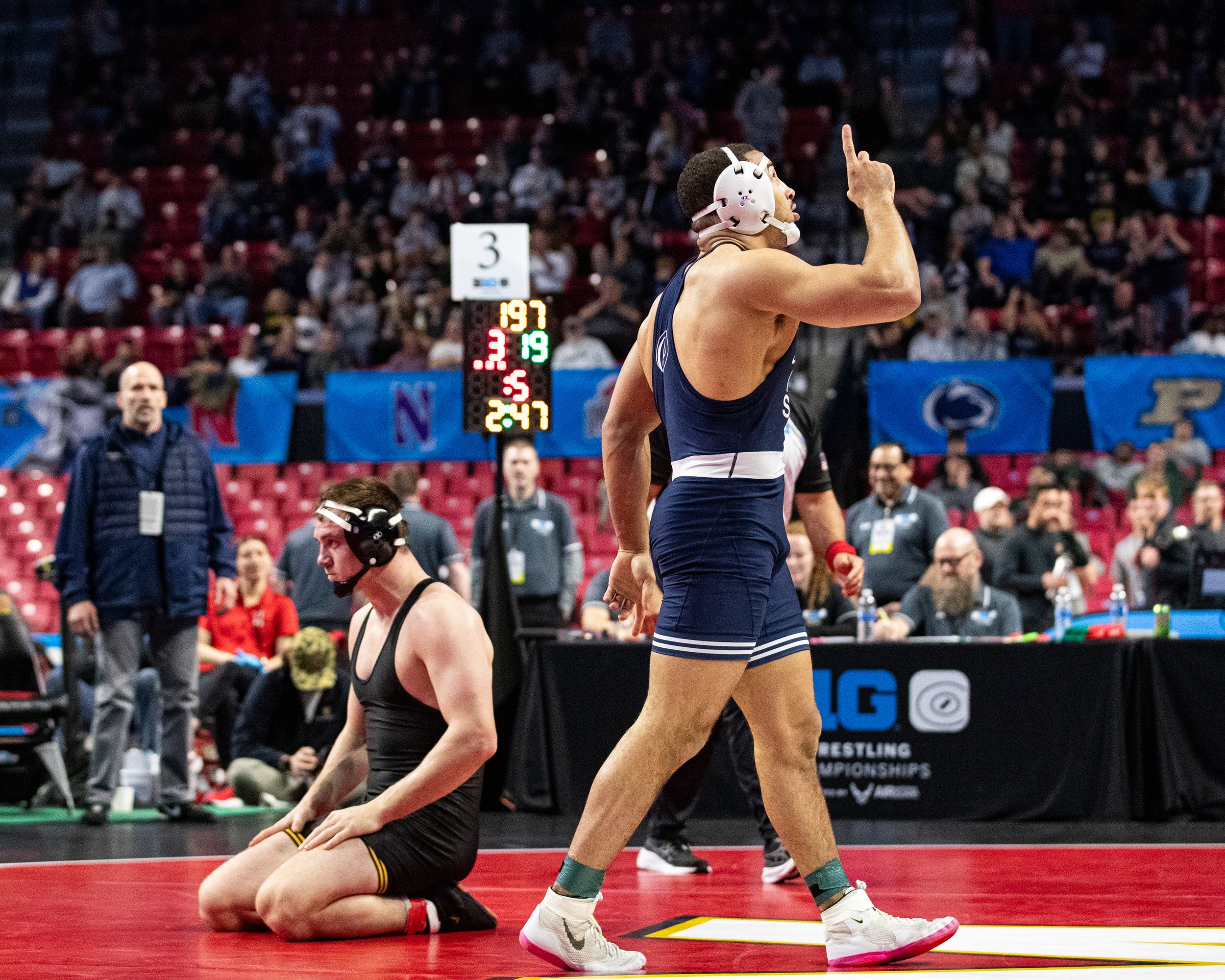  Iowa wrestler Zach Glazier sits on the mat after being defeated by Penn State’s Aaron Brooks in a 197-lb championship match during the Big Ten Wrestling Championships at the Xfinity Center in College Park, Maryland on Sunday, March 10, 2023. Glazier