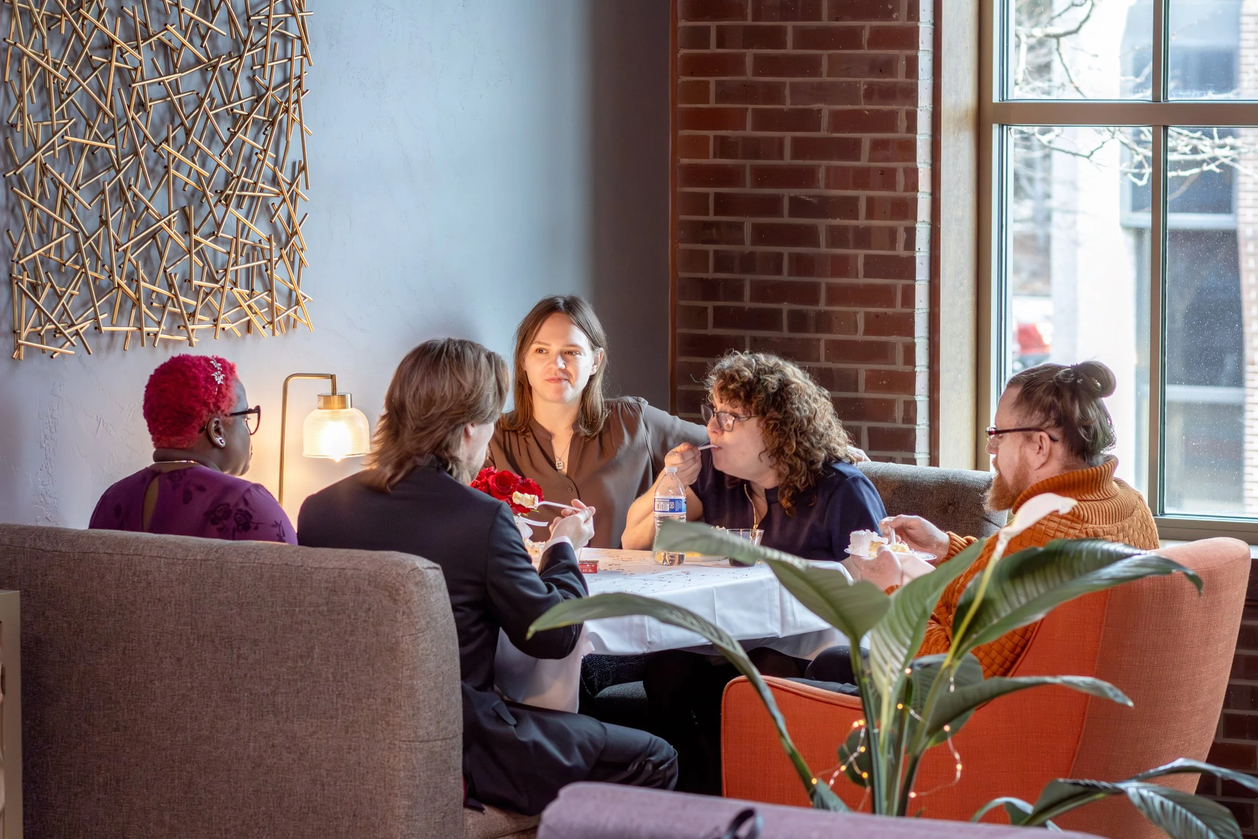 An intimate micro wedding ceremony at The Nest, downtown Green bay Wisconsin allows for intimate seating.