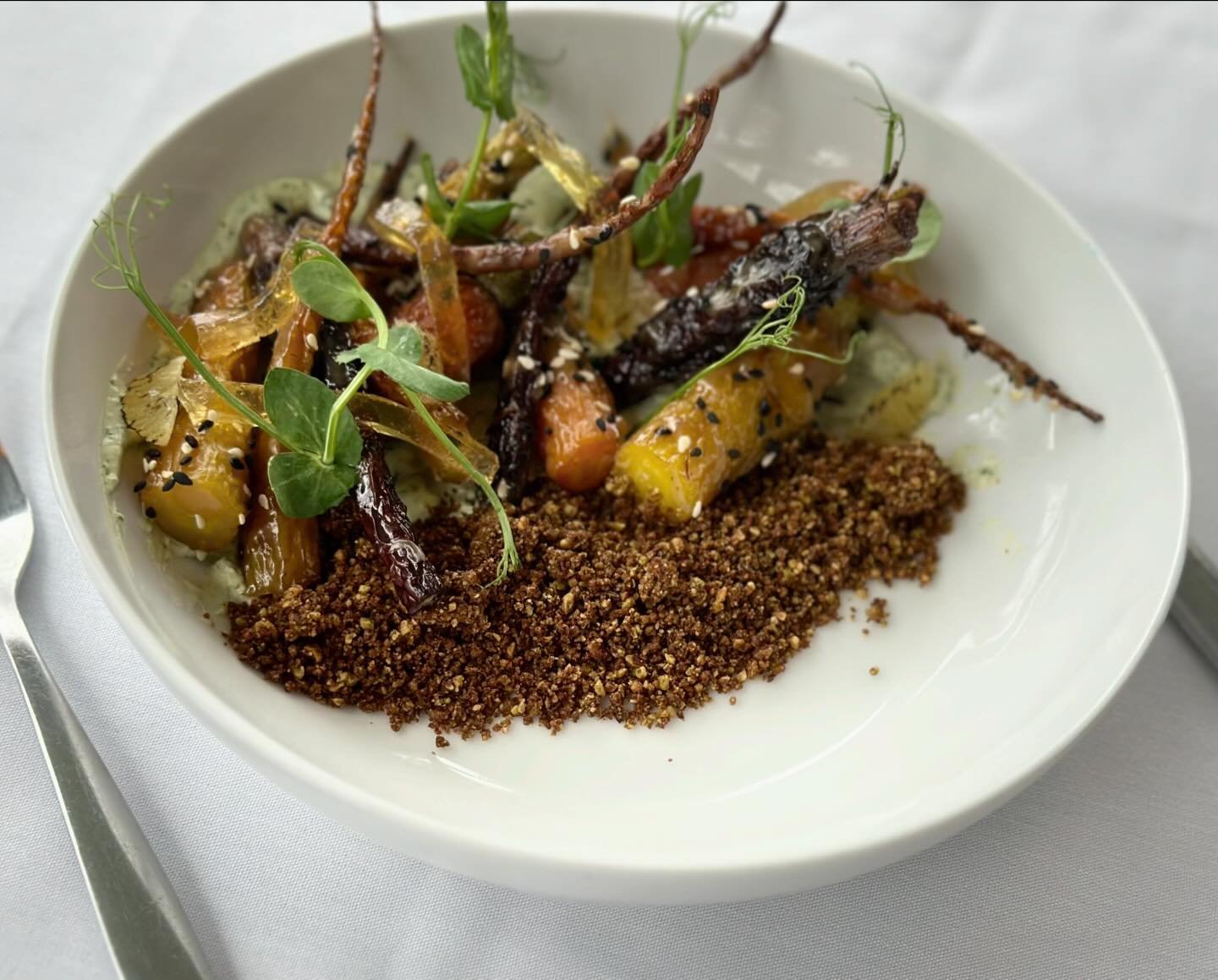 It&rsquo;s your last week to try this beauty!

Sorghum glazed carrots, pumpernickel pistachio, chamomile honey, whipped goat cheese, charred lemon vinaigrette, and pea tendrils.
