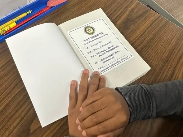A Rio Vista student looks through a new dictionary.