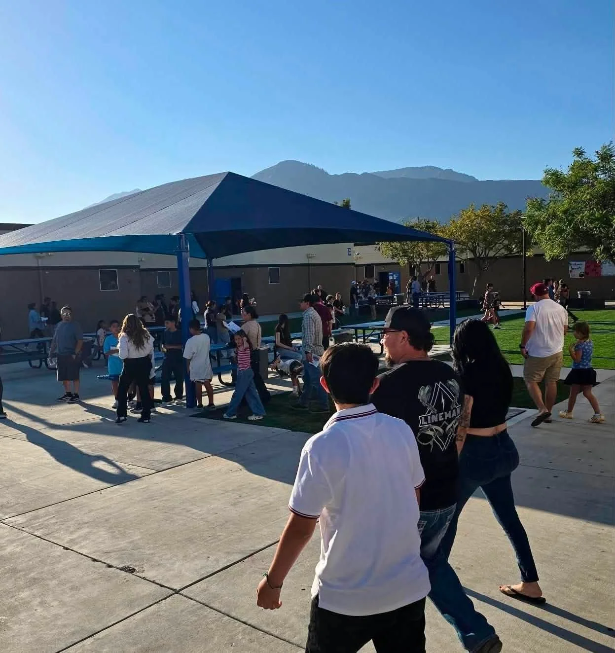 Students and families gather in the Fillmore Middle School courtyard during Back to School Night.