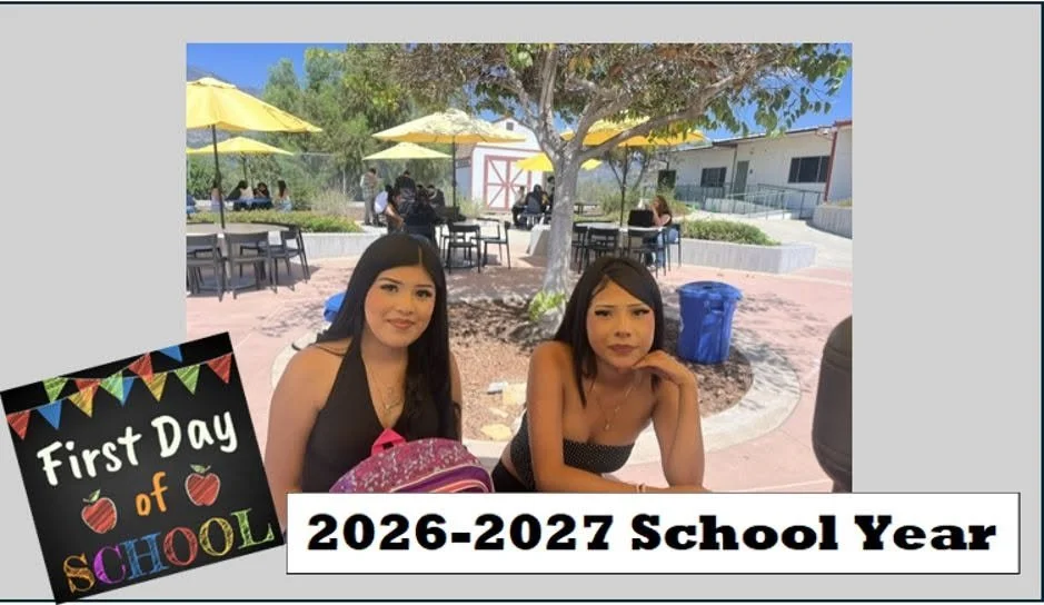 Two Sierra High students sit together outdoors on the first day of school.