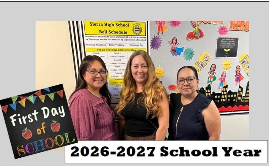 Three Sierra High staff members pose beside a school bulletin board.