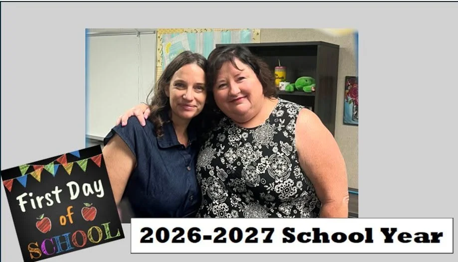 Two Sierra High staff members pose together inside a classroom.