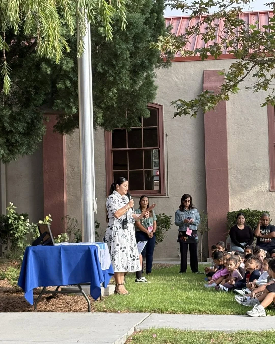 Piru students watch the Promising Practices flag ceremony.