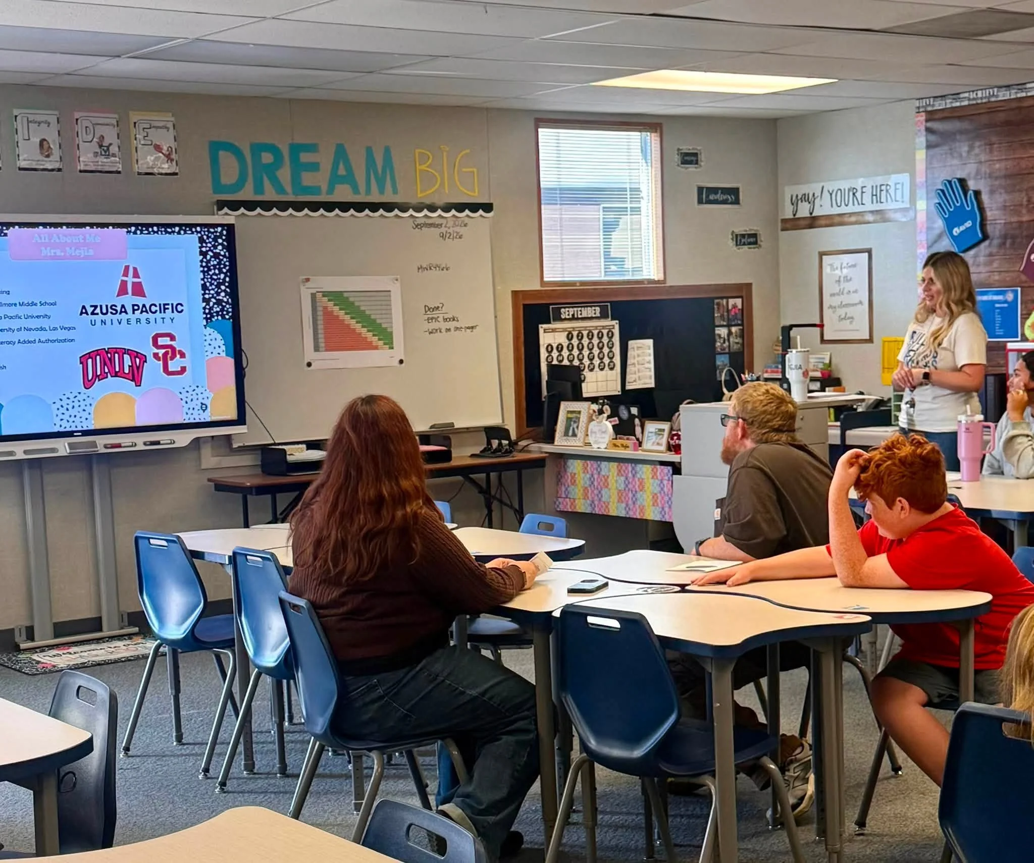 A teacher shares an introductory classroom slide with Bulldog families.