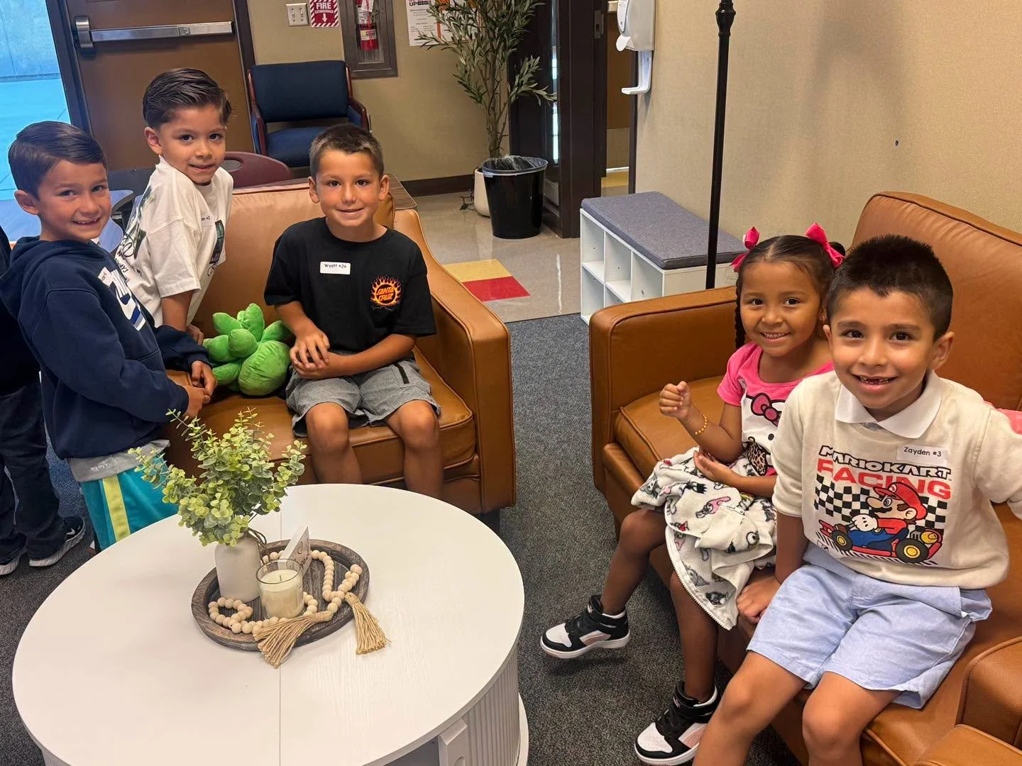 Students explore the seating area during their Wellness Center tour.