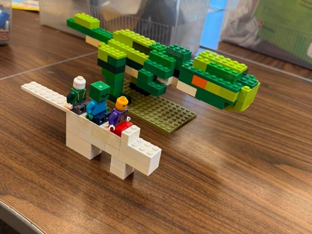 Students share their finished LEGO builds at Rio Vista.