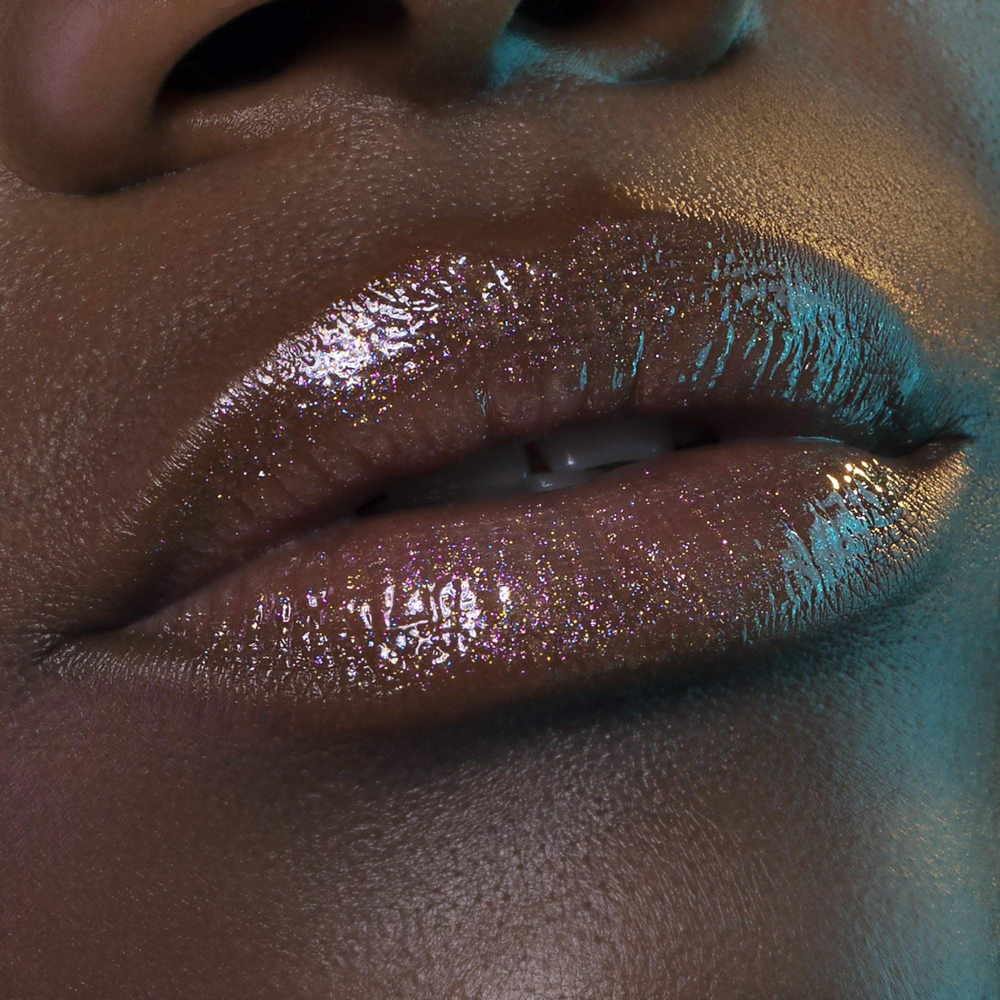 UNEARTHLY_RESURGENCE_BEAUTY_LIPGLOSS_SWATCH_DEEP.jpg
