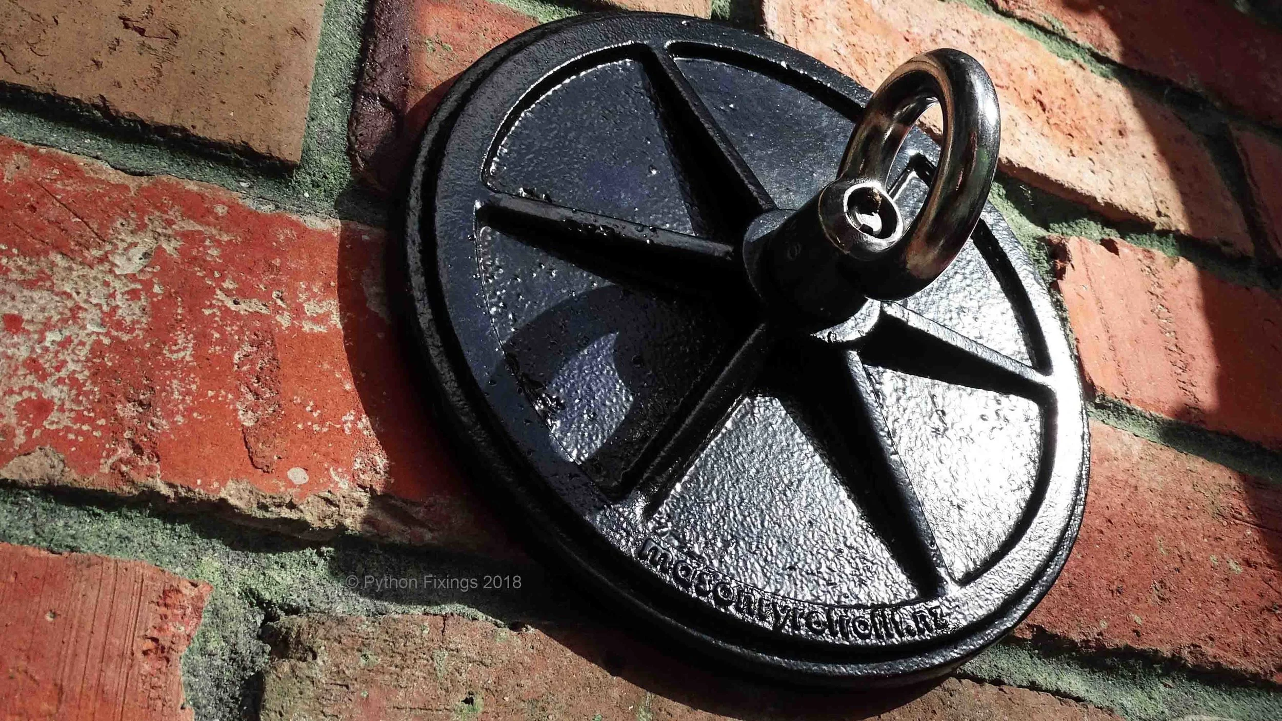 Securing the canapy to the masonry wall