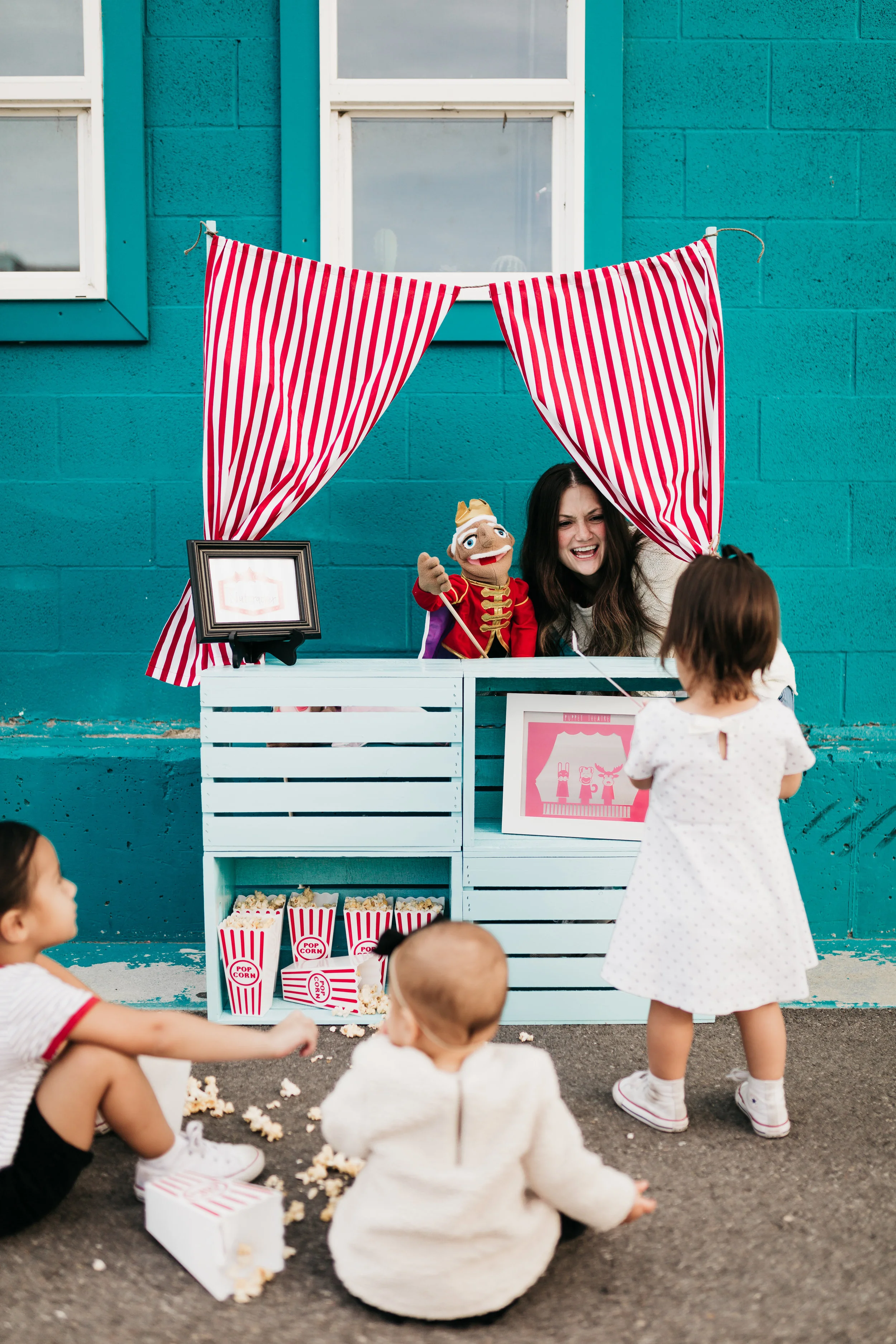 Whether you’re a preschool teacher or parent, this DIY play stand is sure to steal the show!