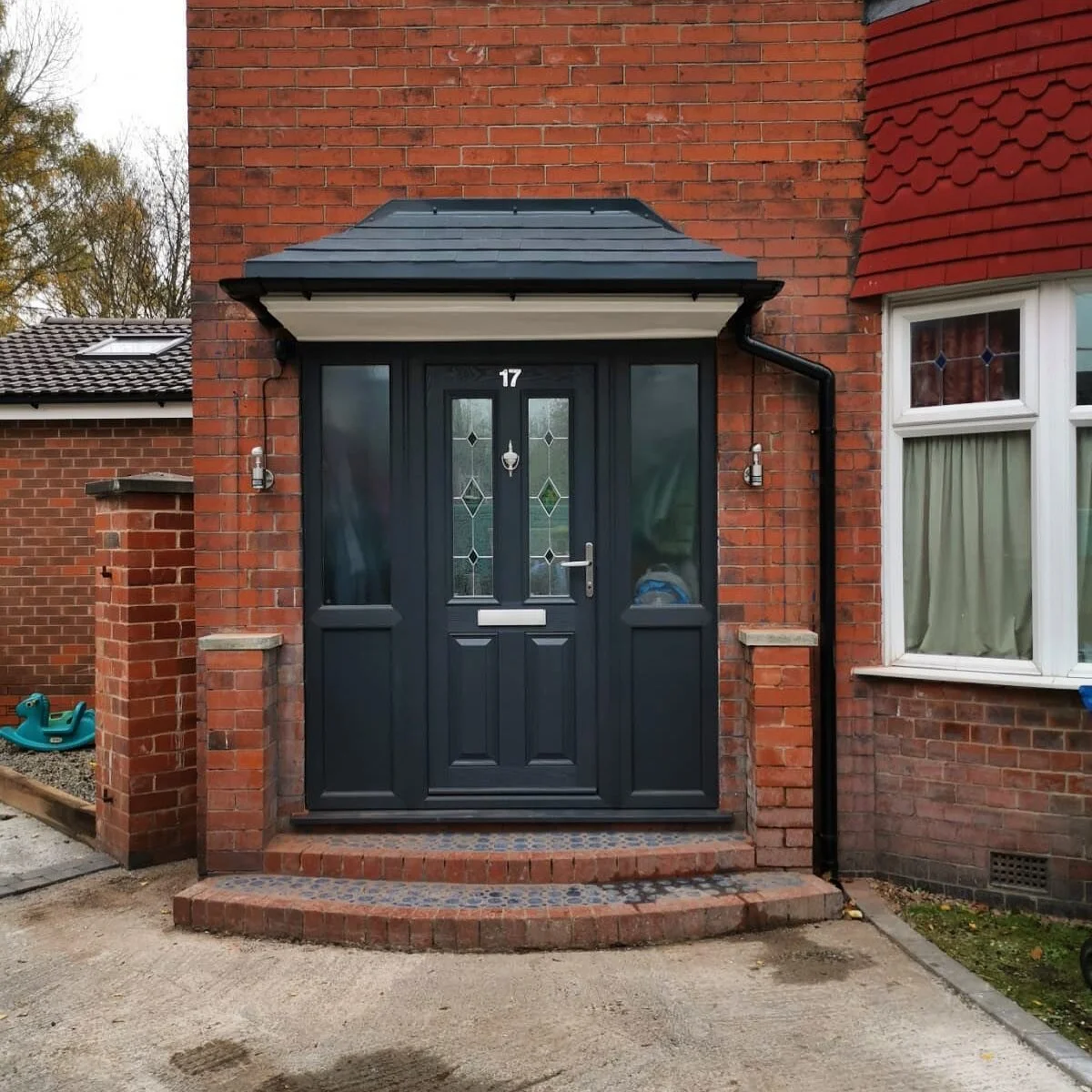 A recent job installing two outdoor wall lights that work beautifully with this modern front door. 
We&rsquo;re really excited to announce that our business is moving to Prestwich! If you are in the area and need any work doing then please get in tou