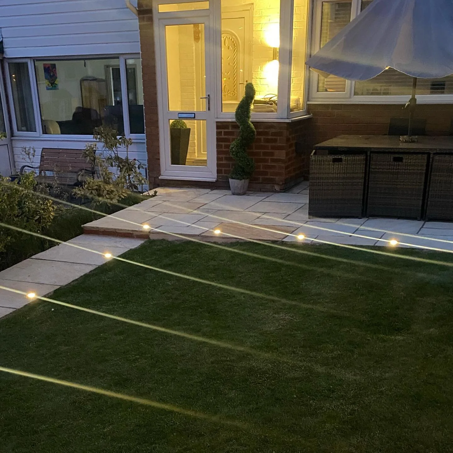 A smart ground light installation for a client in Prestwich. We dug channels and lifted flags to install the cabling and lighting &mdash; looks pretty nice now the flags have been relaid and everything is nice and neat!

If you want any outdoor light
