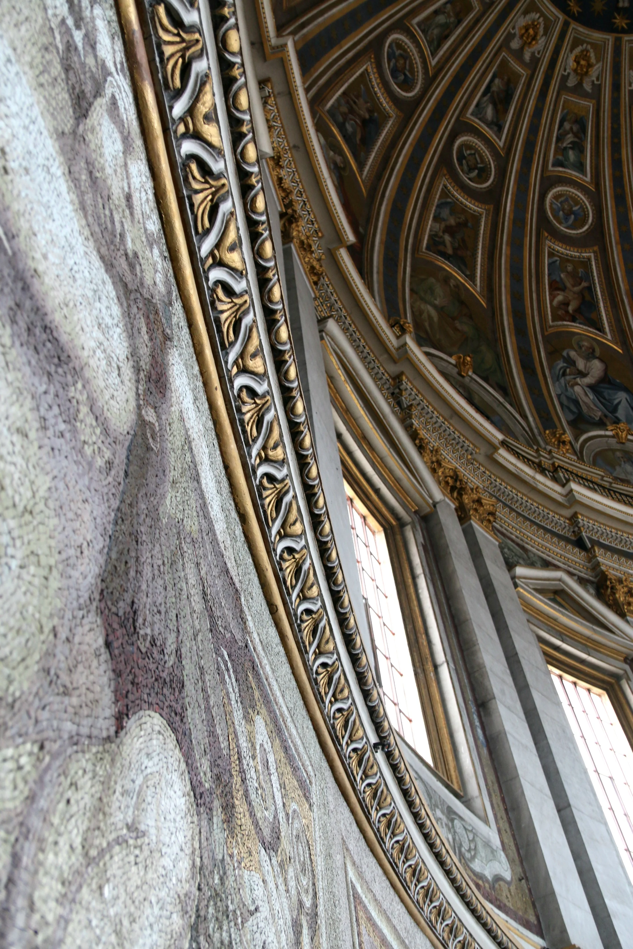 the walls are embellished with mosaics and ornaments