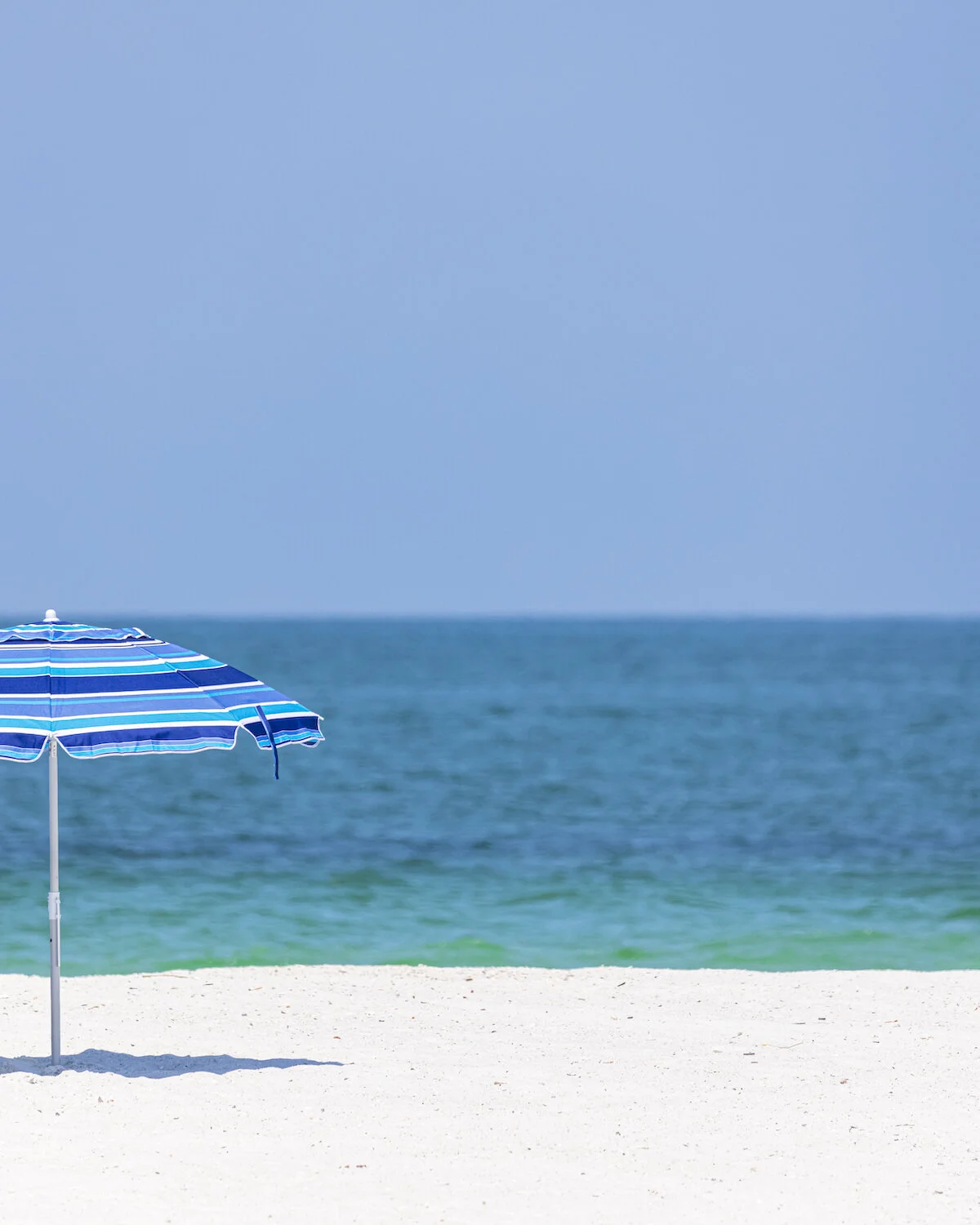 Ocean with beach umbrella