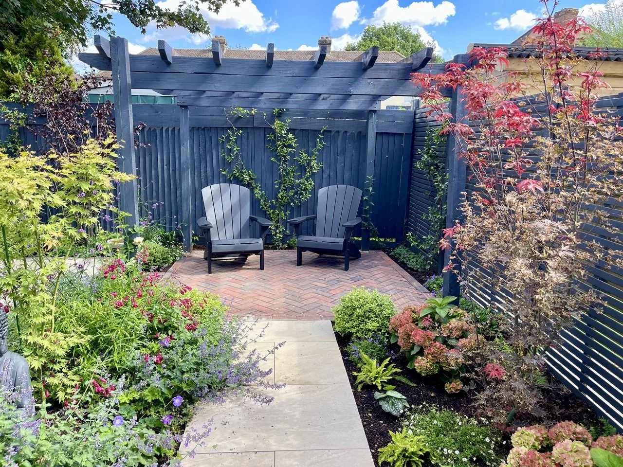 Gardens by Knight courtyard garden with pergola.jpeg